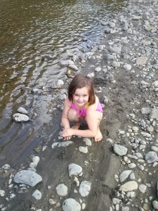sarah playing in the river
