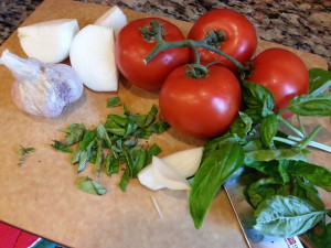 summer abundance…tomatoes and basil from the garden and kitchen staples of an onion and garlic cloves make this recipe 